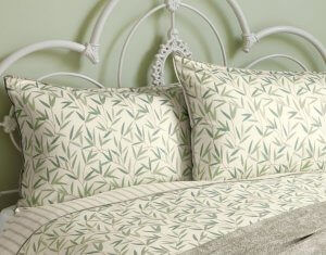 White forge headboard for an elegant and simple master bedroom