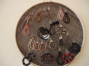 You can use old sieves to hang earrings.