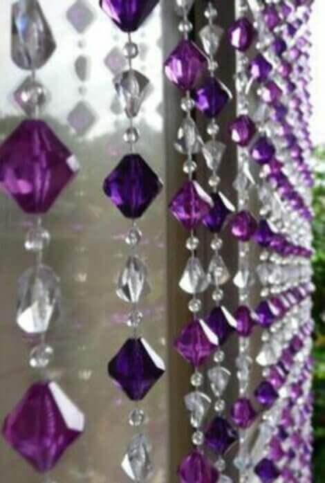 Sound curtain made with clear and purple crystals