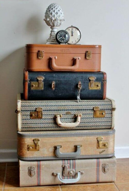 In-style storage: five suitcases piled on top of each other.
