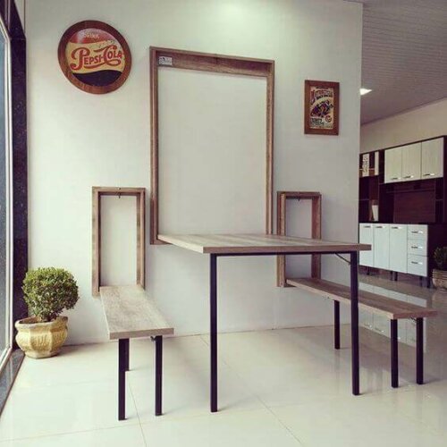 A table connected to the wall.