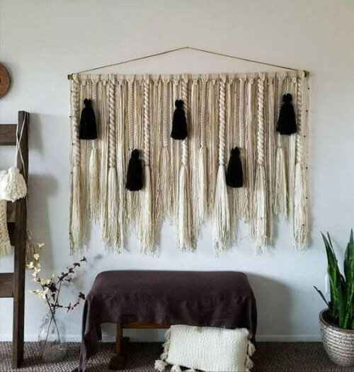 A black and gold decorative element on the wall.