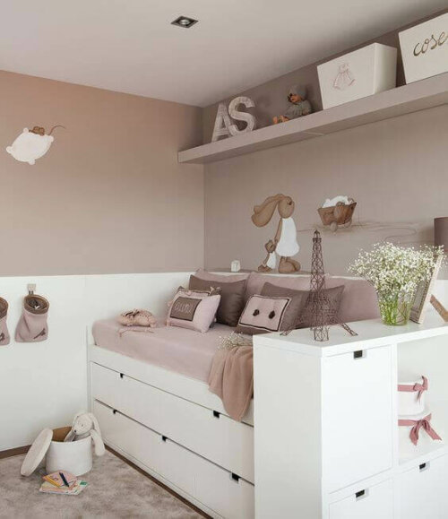 A trundle bed with a folding headboard is great for a child's room.