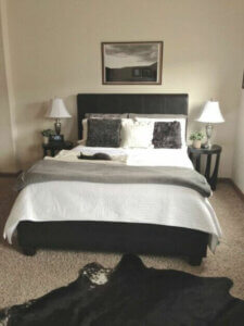 Beige, gray and black bedroom decor.