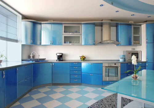 A kitchen decorated with blue.