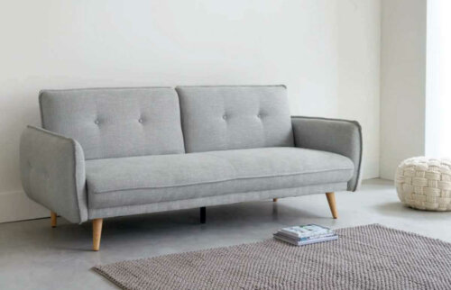 A gray Maison du Monde sofa.