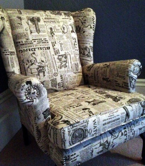 An armchair with a newspaper pattern.