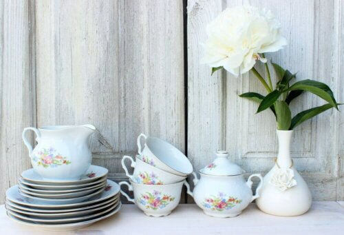 Antique dishes sitting on a table as a decorative trend