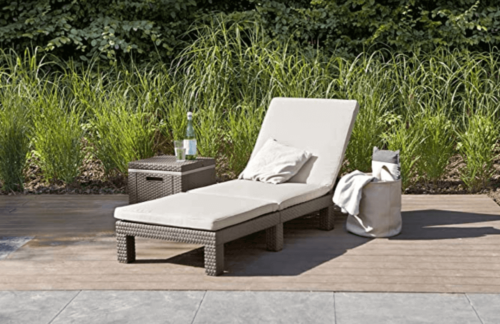 A lawnchair in a solarium at home.