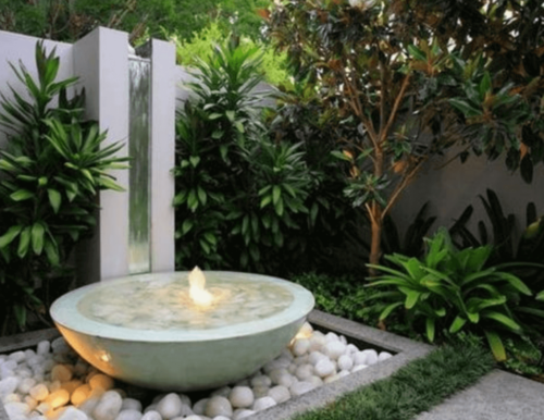 A round minimalist fountain in a garden.