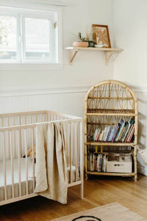 Baby's nursery with a booshelf