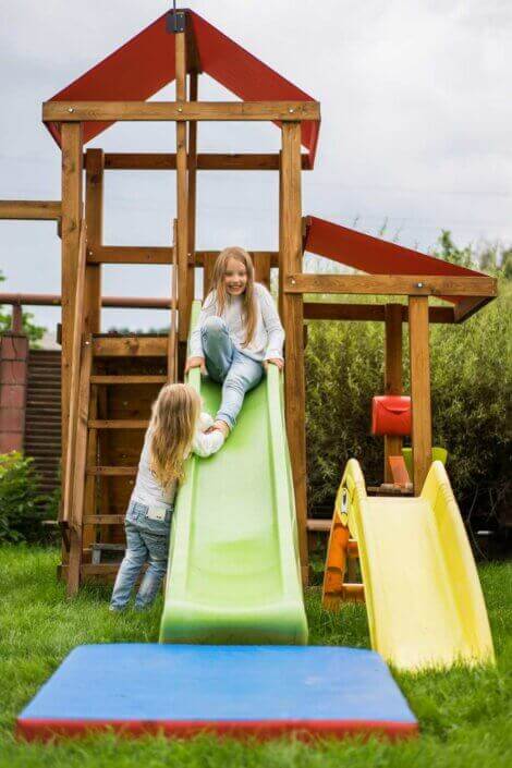 Children playing on a slide