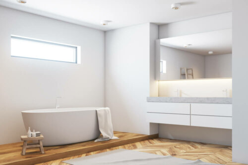 A bathroom with a wooden floor.