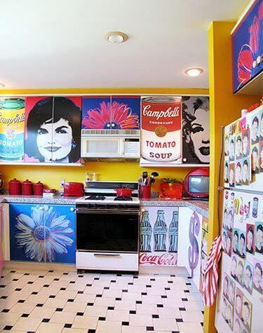 A kitchen with a lot of pop art.