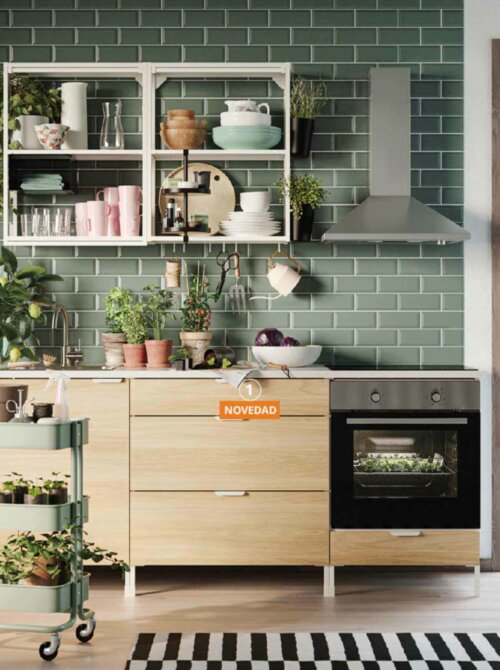 A kitchen with some shelves from the IKEA catalogue.