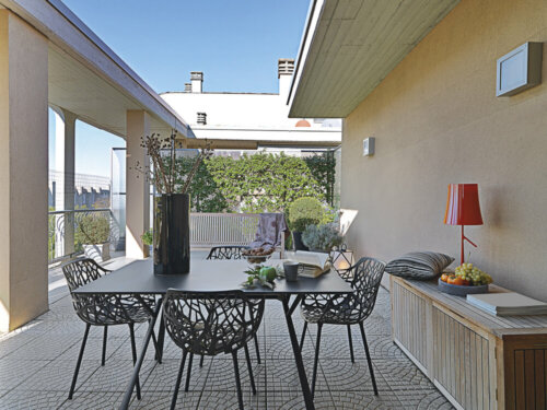 A terrace with outdoor furniture.