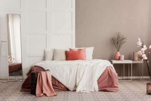 An elegant bedroom with neutral colors.