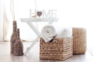 Some baskets with towels inside.