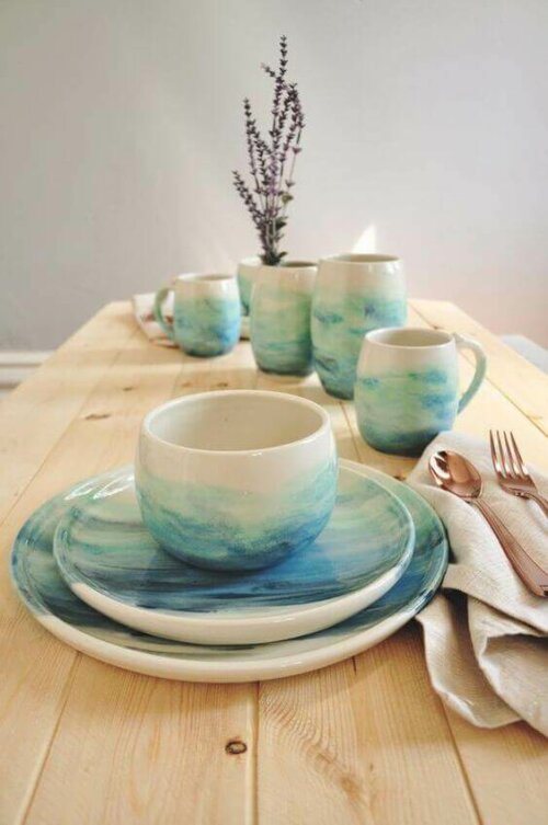 Some colored dishes on a table.