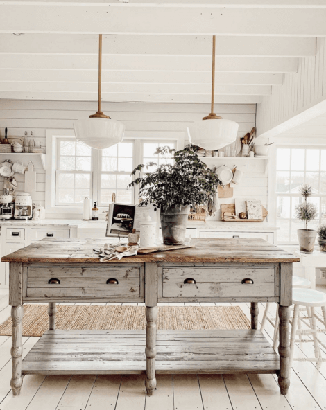 A country kitchen with a shappy chic piece of furniture, often found in appealing kitchens