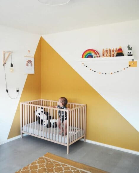 A nursery with ochre on the wall