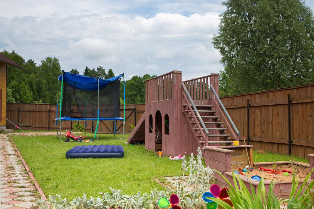 Install a playground in your backyard for your children.