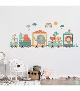 A decorative vinly of a train in a baby's room.