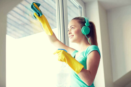 A woman cleaning her windows.