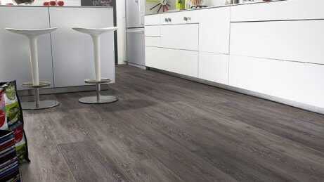 Room with a wooden floor and white walls