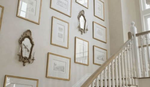 A stairway with pictures.