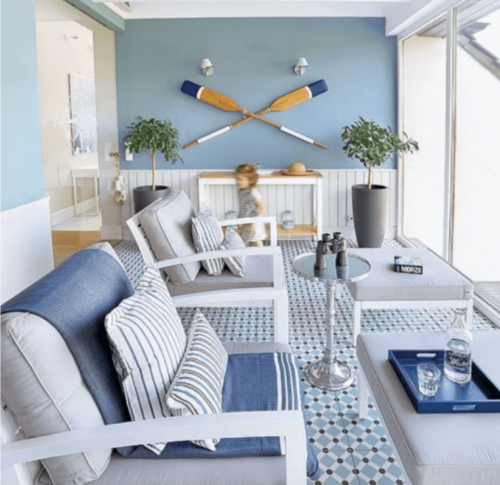 A child playing in a summer living room.