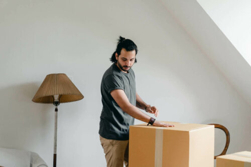 A man packing up his things.
