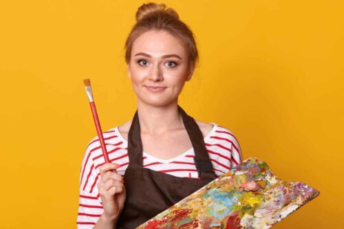 A woman ready to paint.