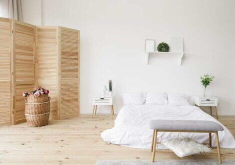 Room with wood floors, and white walls 