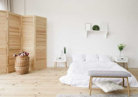 Room with wood floors, and white walls