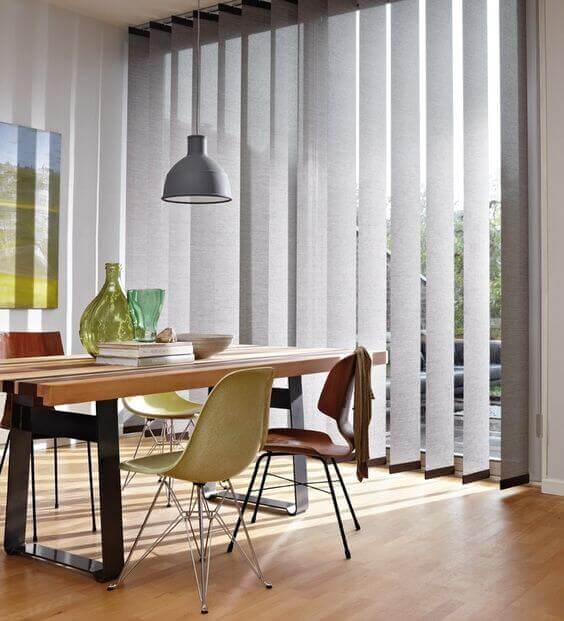 Vertical shutter blinds.
