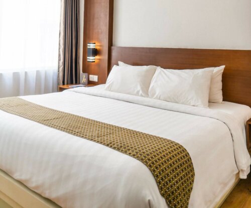 A wooden headboard.