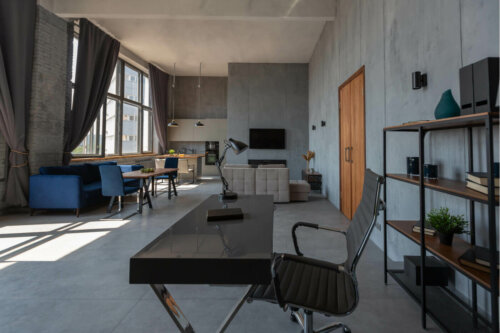 An open apartment with hanging lamps.