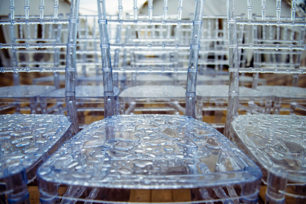 Clear plastic chairs are light and resistant.