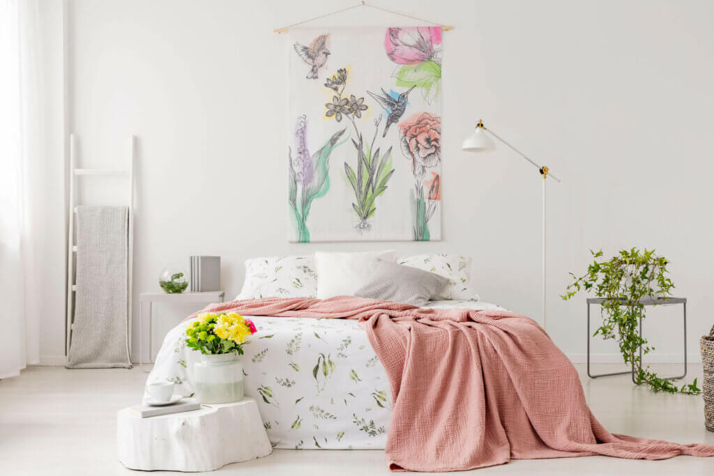A bright bedroom in pastel shades.