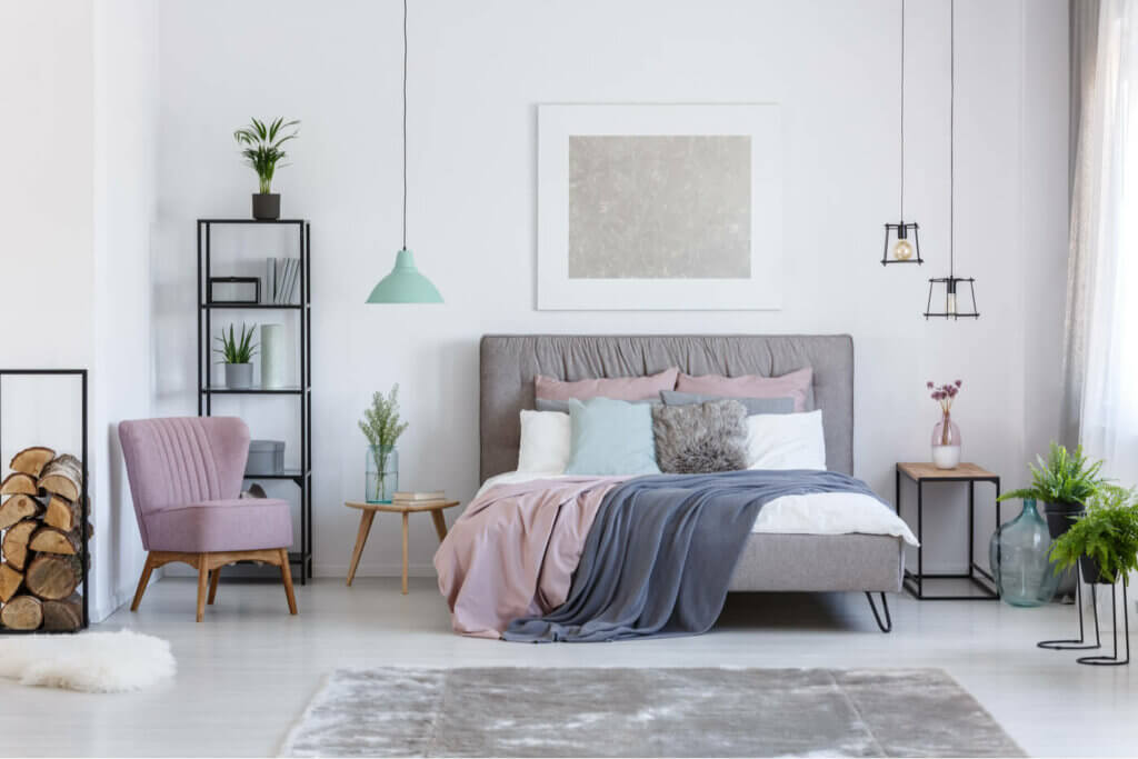 Different kinds of nightstand: a bedroom in pastel shades.