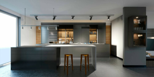 A modern kitchen with low lighting.