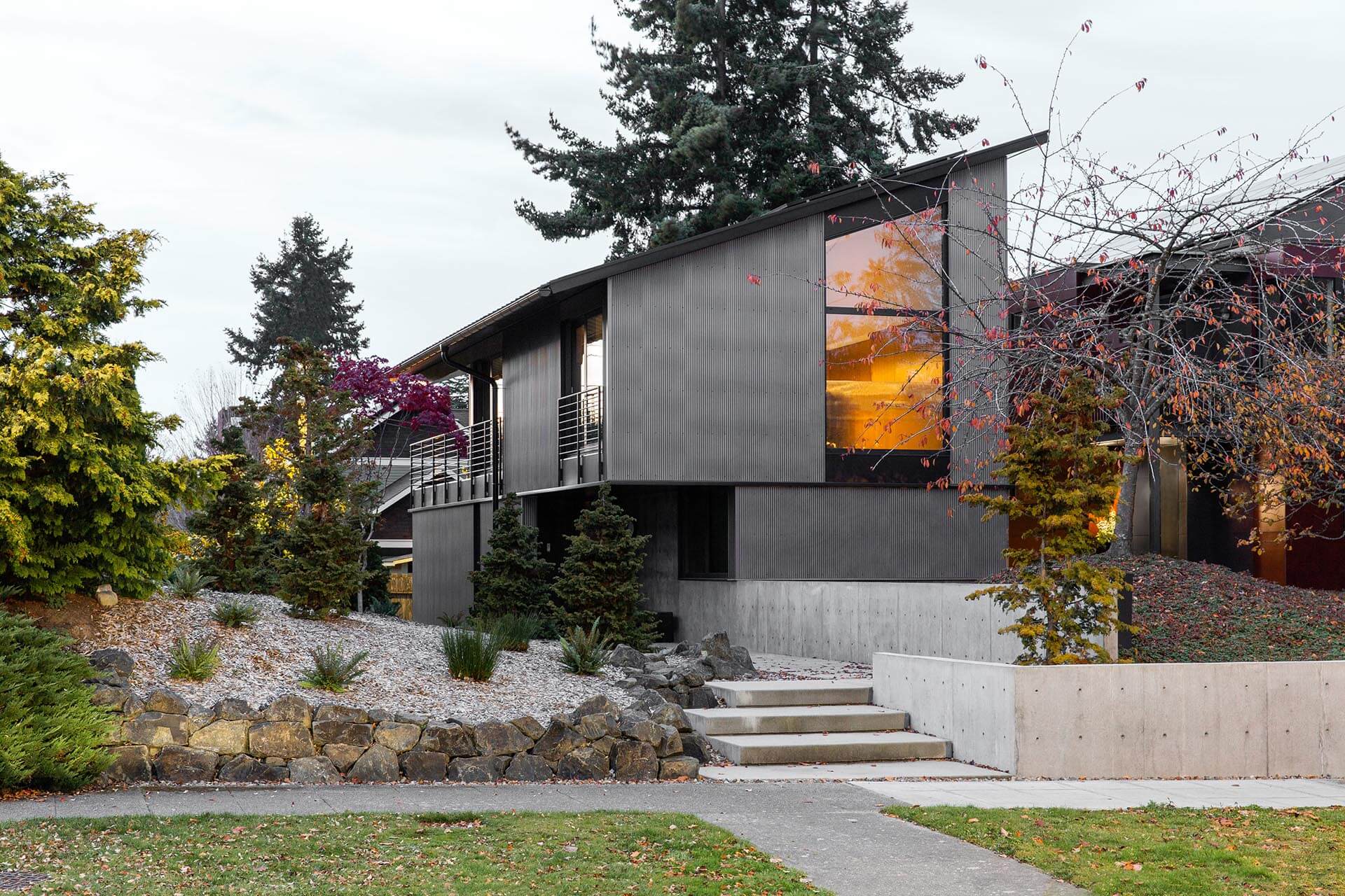 A dark grey corrugated metal home.