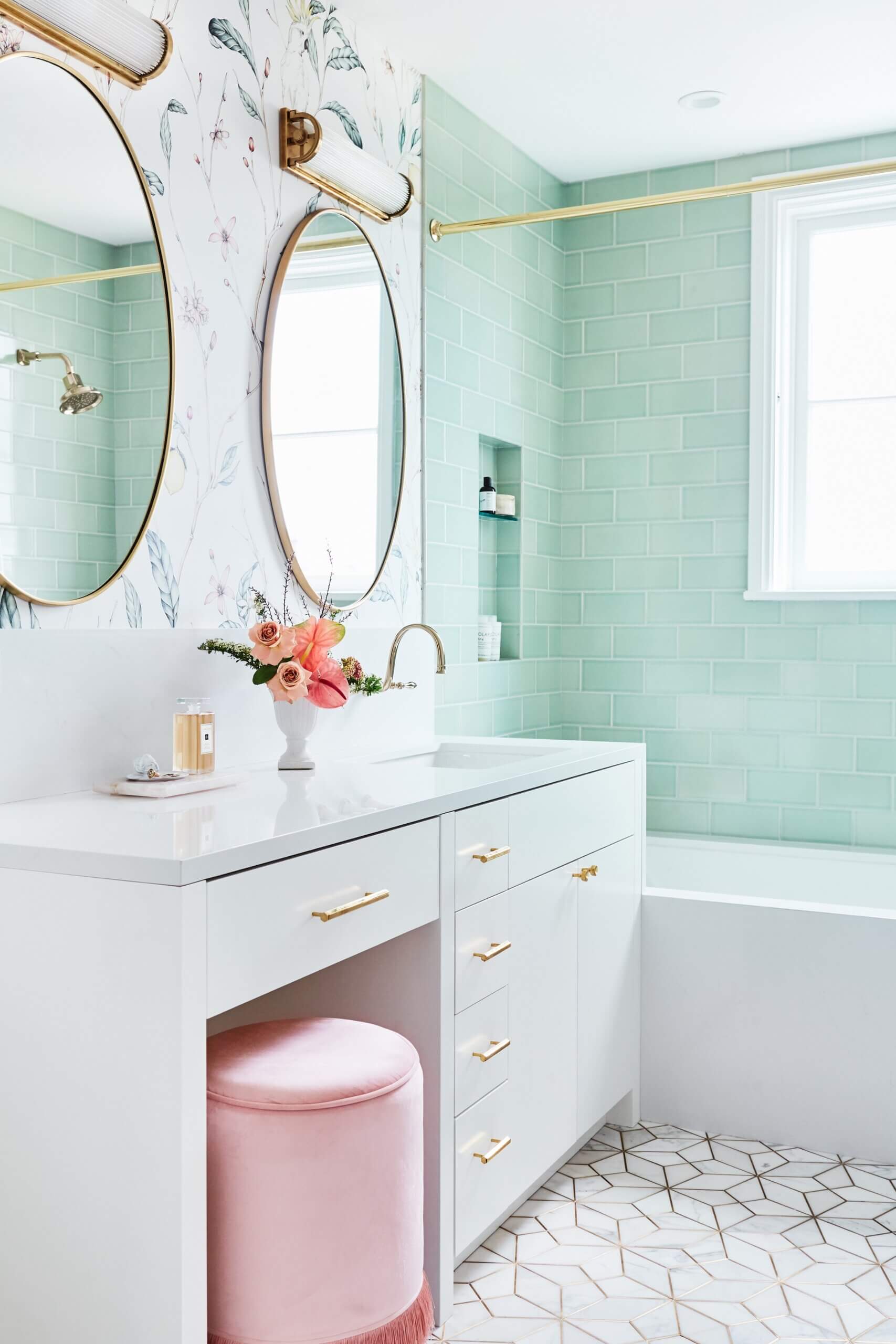 A seafoam green and white bathroom.